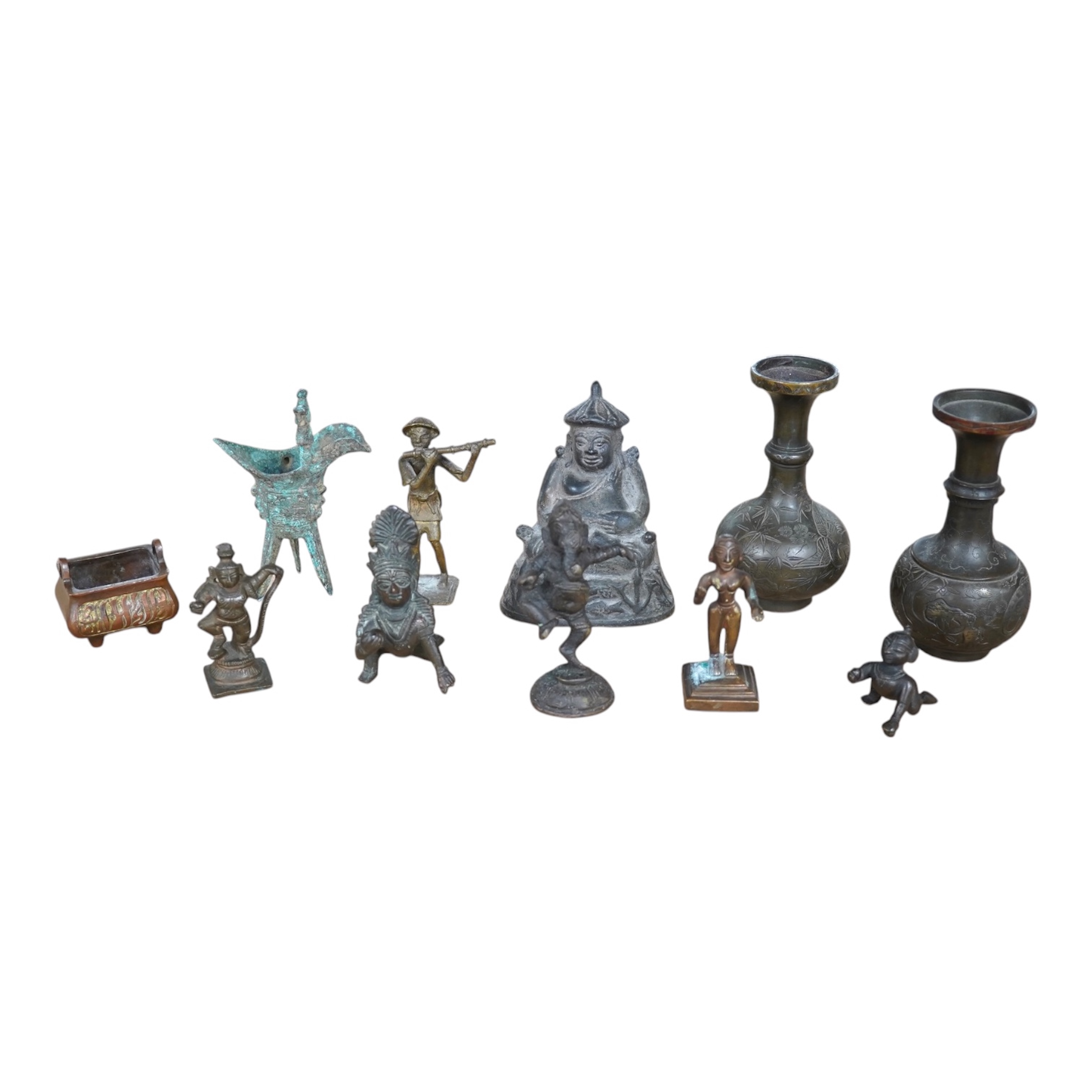 A group of Chinese and Indian bronze figures and vessels, 19th century and later, tallest 12cm. Condition - varies